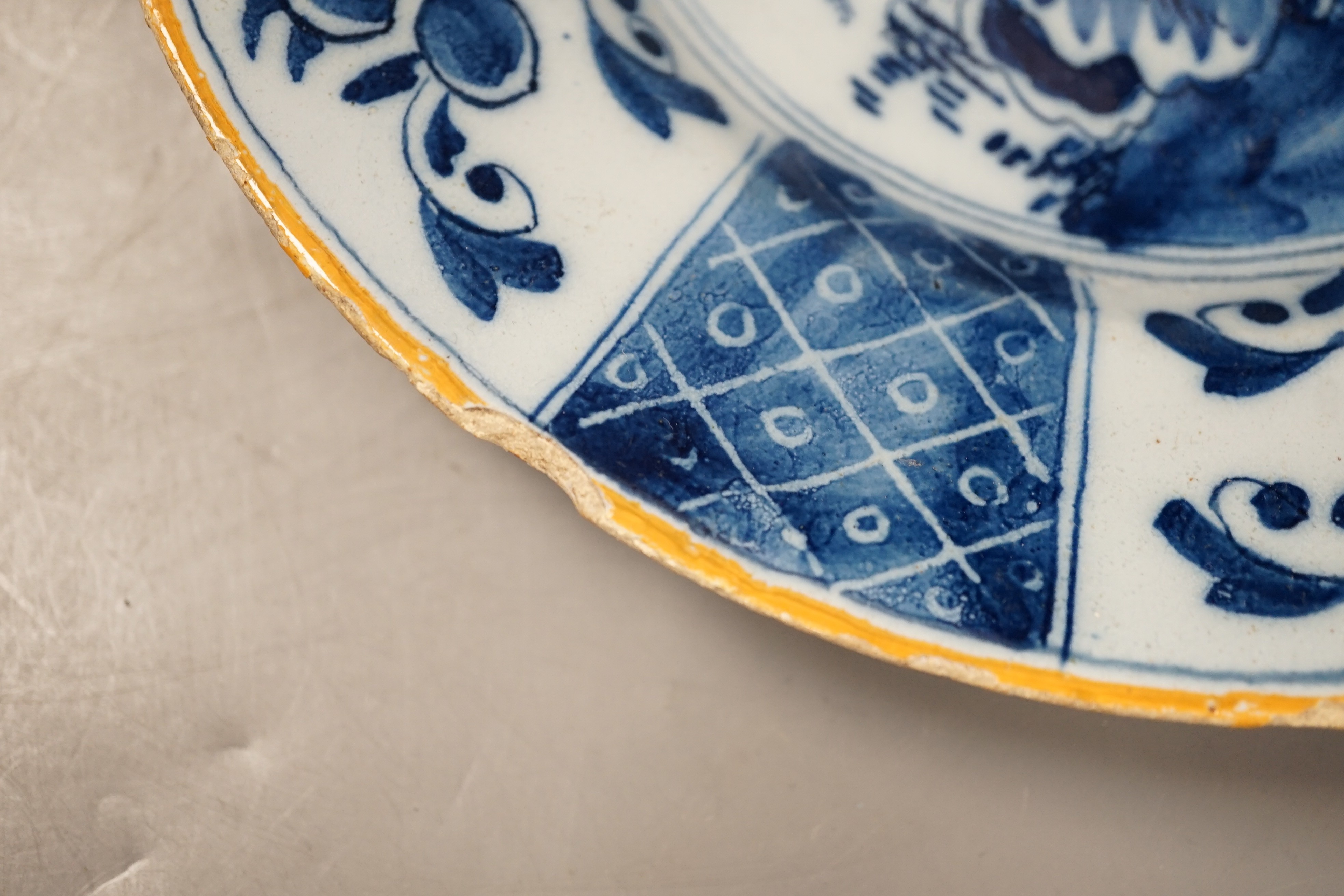 Two 18th century Dutch Delft blue and white plates, largest 23cms diameter